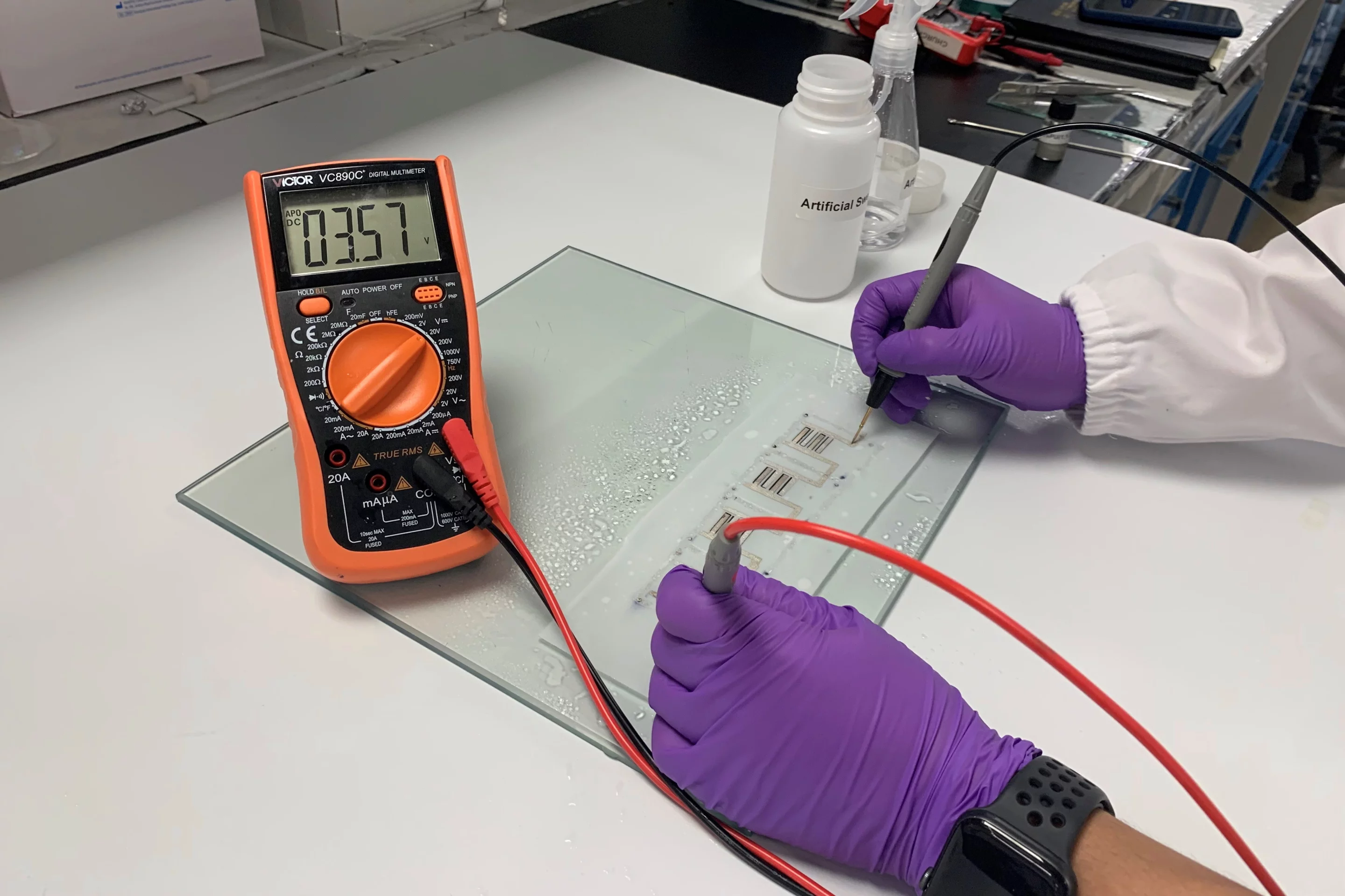 After being sprayed with artificial sweat, a strip of the batteries generated 3.57 volts of electricity
