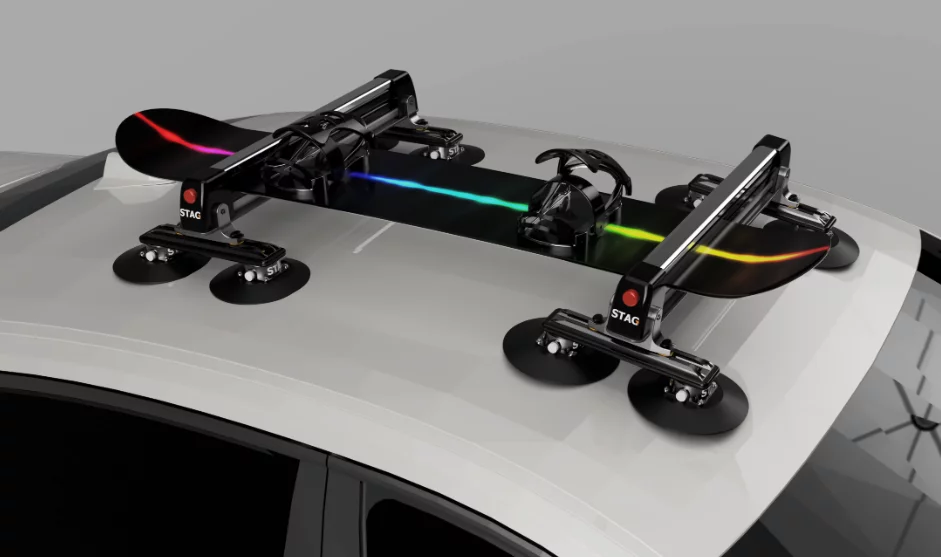 It looks like you'd have to stack snowboards atop each other to get to four - Stag Rack says it positioned the height of the rack to allow for storing a snowboard upside down, with bindings facing at the car roof