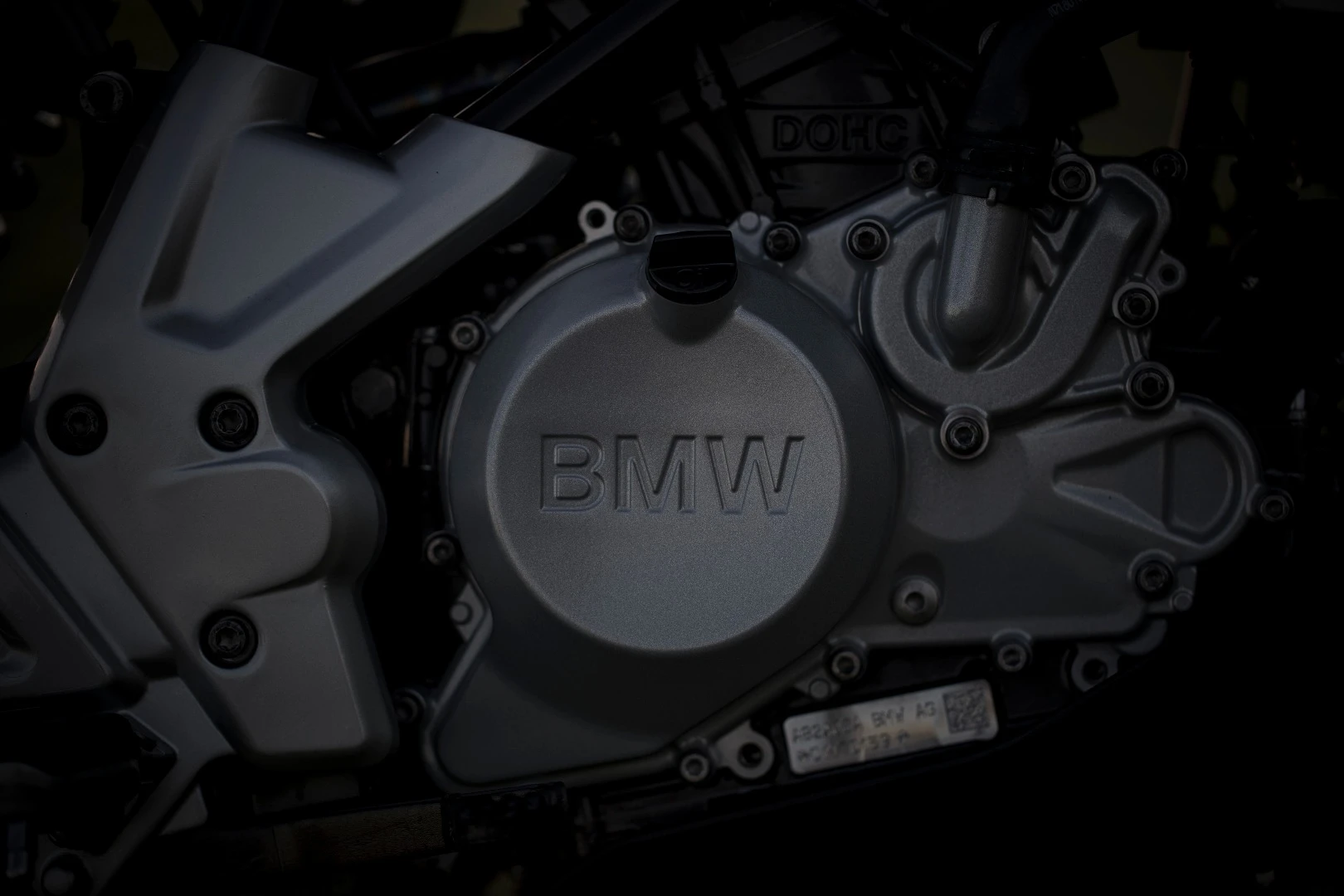 BMW G310R: 313cc single-cylinder motor is interesting in that it slants backward in the frame, and has the intake on the front and exhaust on the rear