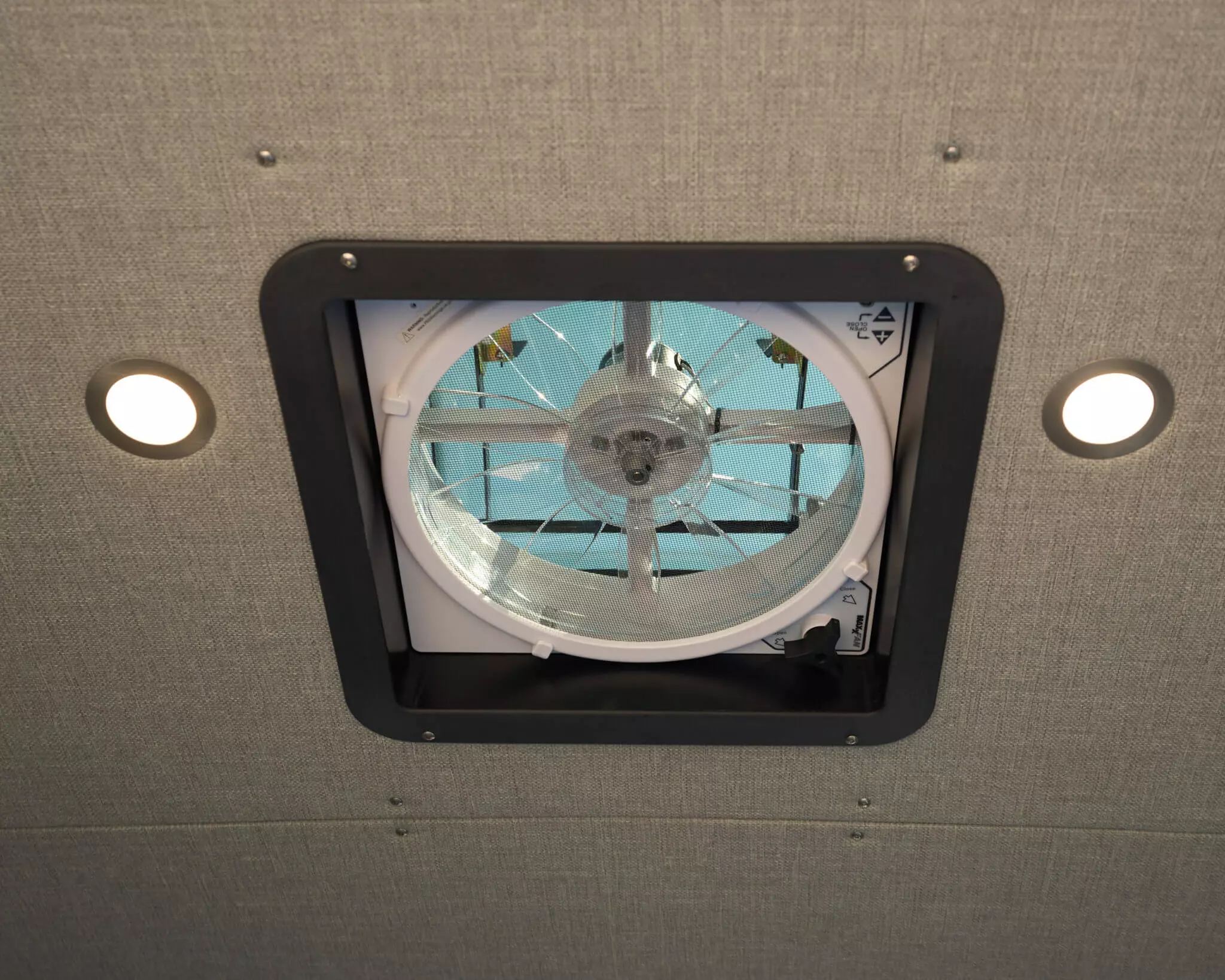 Outside takes care of some tedious lifting like installing roof vent fans - one in the Sprinter 144, two in the 170