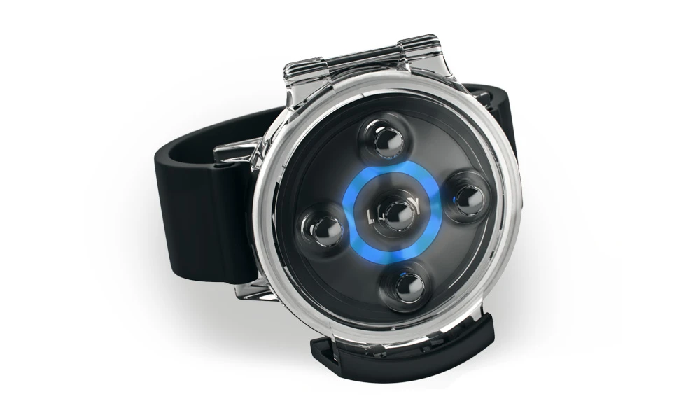 While in flight, Lily communicates with a disc-shaped tracking device that can be worn on the user's wrist