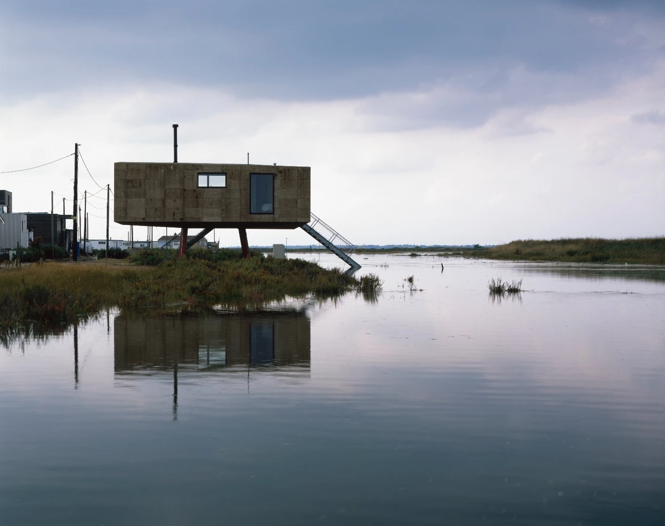 Redshank is an extraordinary dwelling that is raised over the Essex marshlands on steel stilts