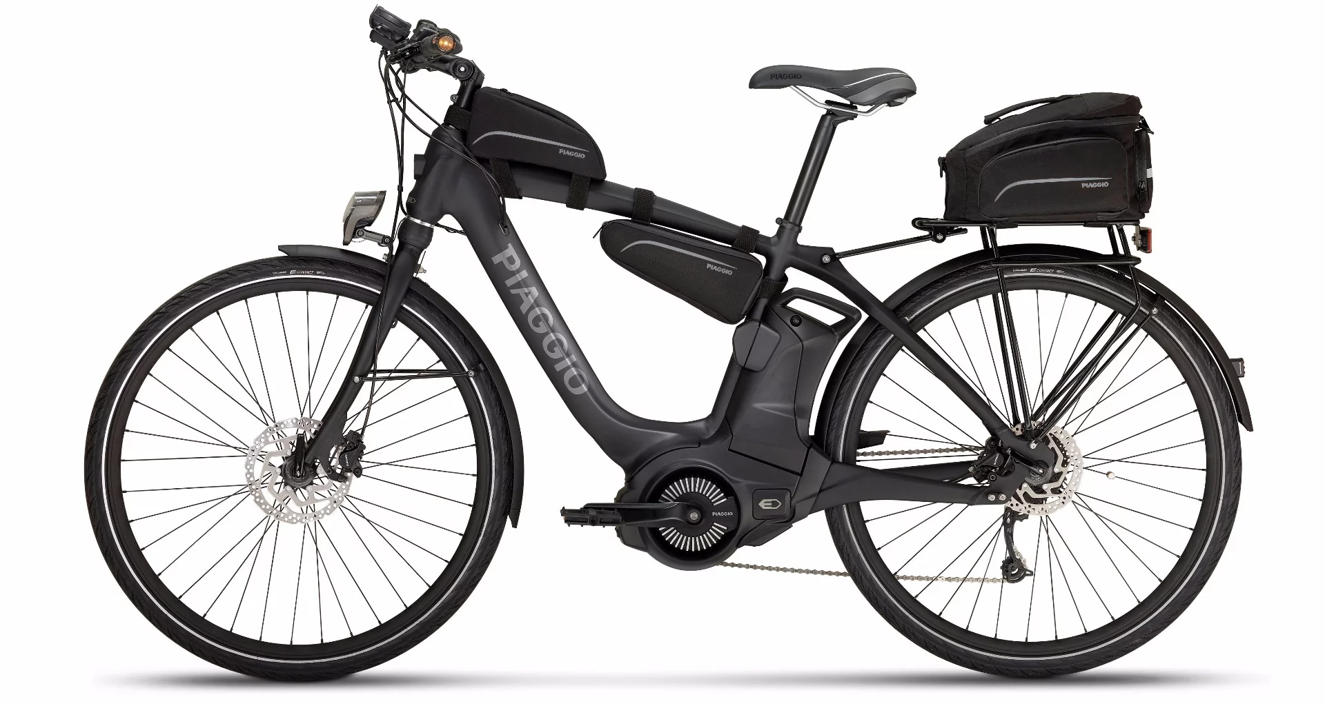 An Active Wi-Bike with accessories including top tube bag, rear rack and bag and comfort grips with direction lights