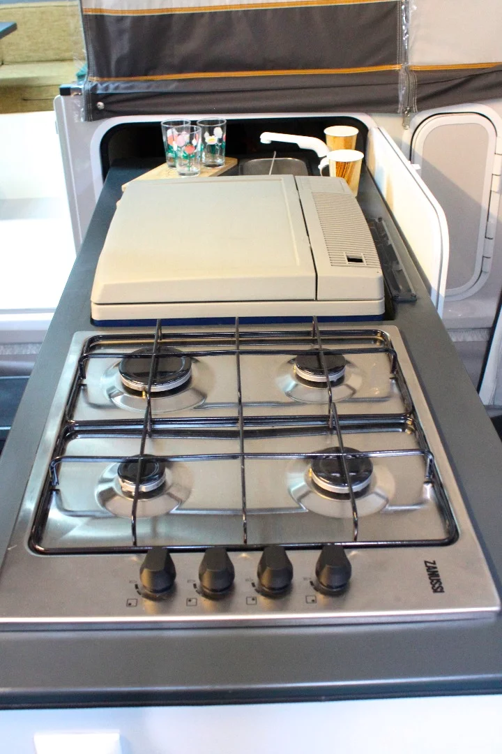 The iCamp packs some extra cooking power with its four-burner stove (two-burners are more standard on small campers)