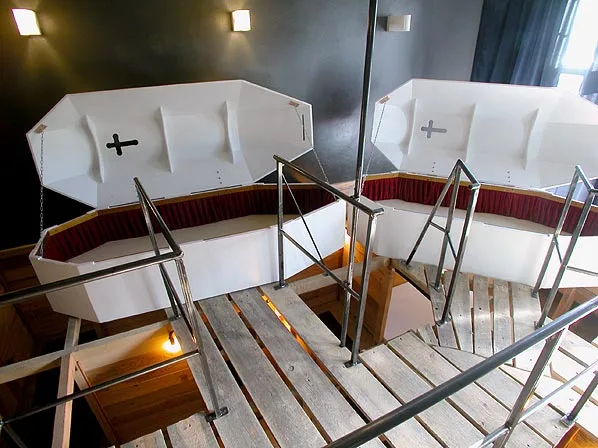The Coffin Room even allows guests to slumber beneath closed lids