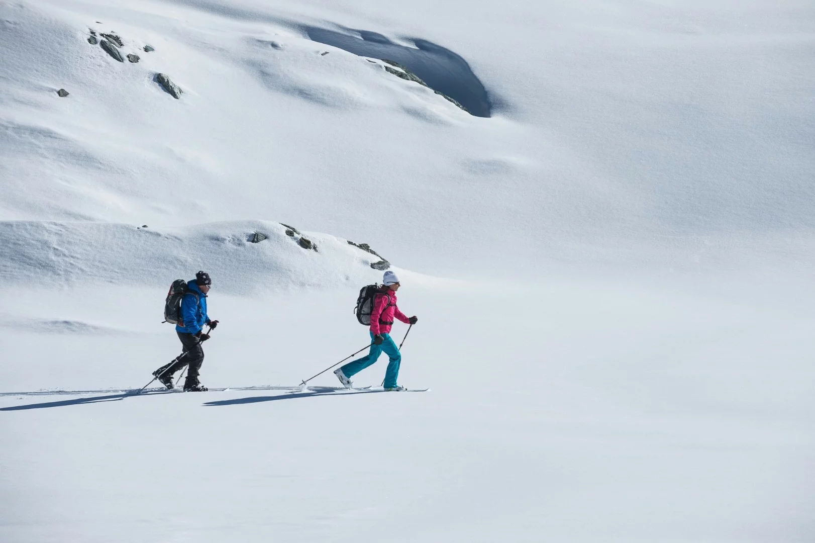 Unlike standard snowshoes, Crossblades glide through the snow like small skis