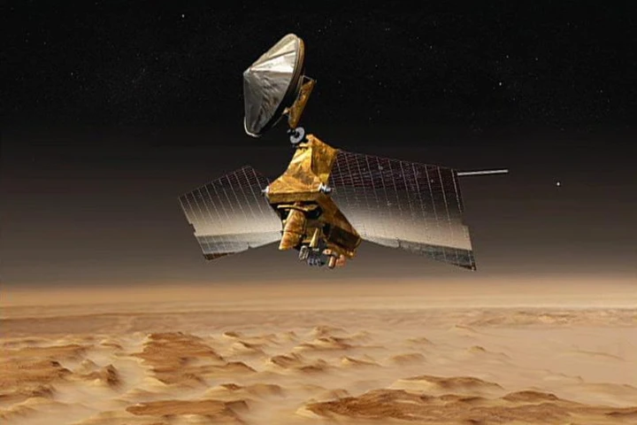 Artist's concept shows NASA's Mars Reconnaissance Orbiter mission over the Red Planet