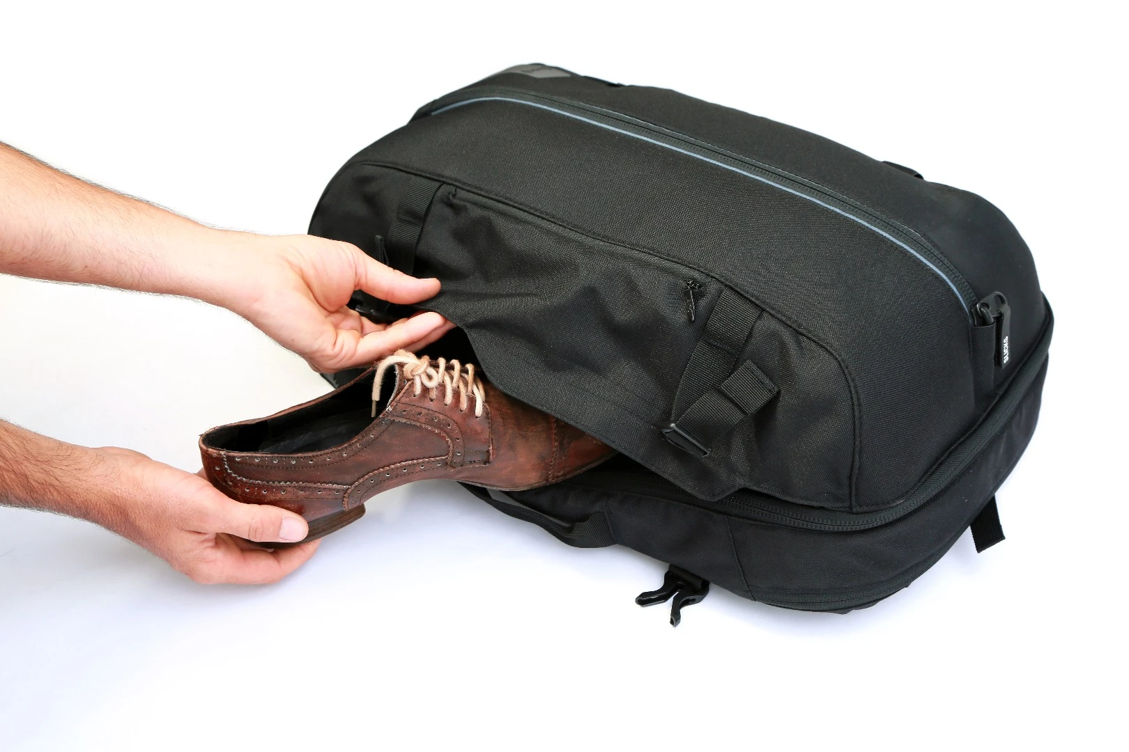 The Slicks bag has an outside pocket for storing shoes