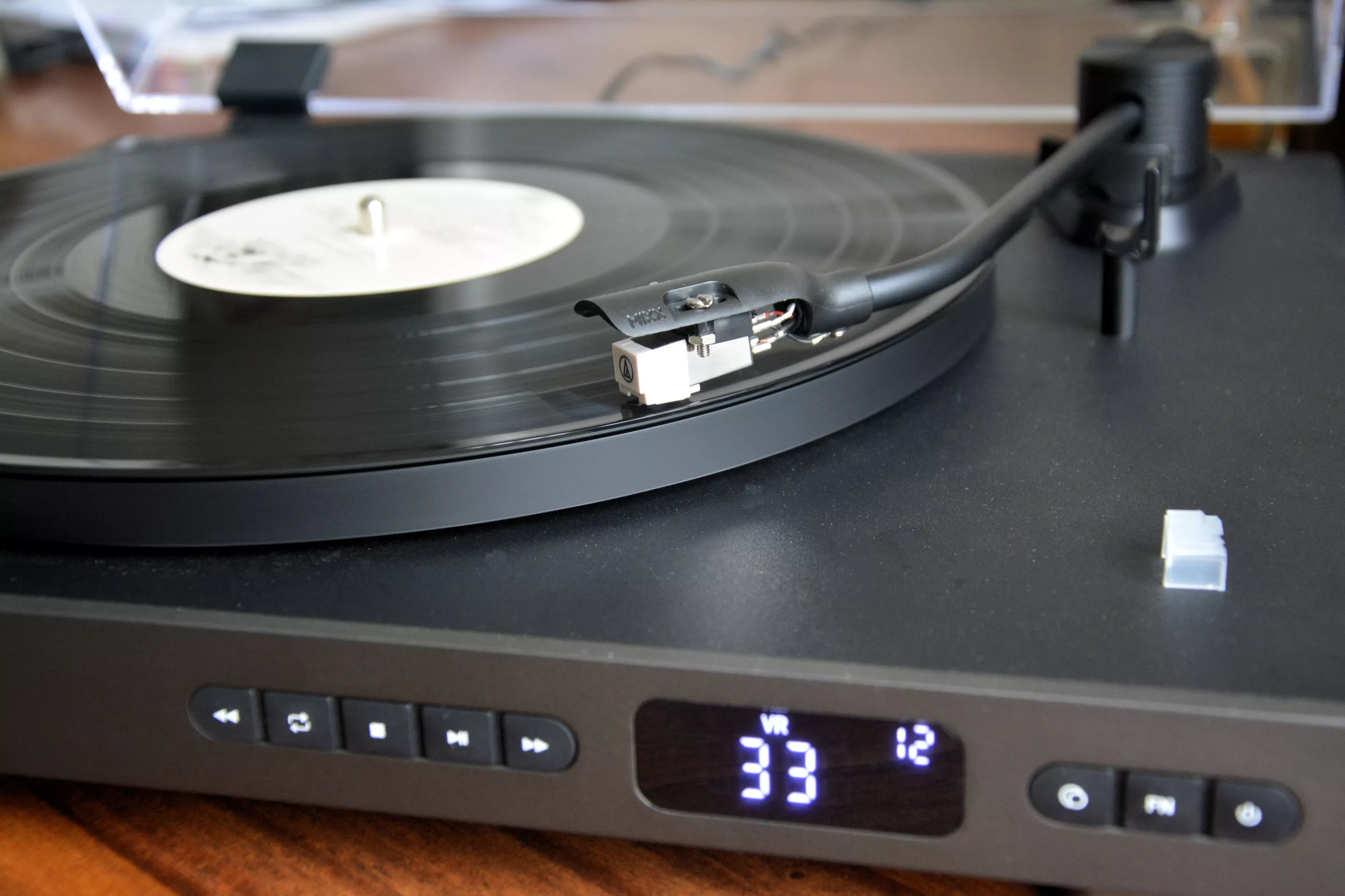 After selecting VR mode on the remote or front panel, popping an album (or single) on the platter, playback is fully automatic