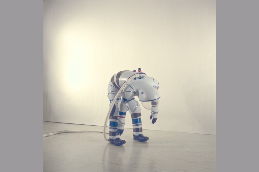 A hard suit showing how far it can bend