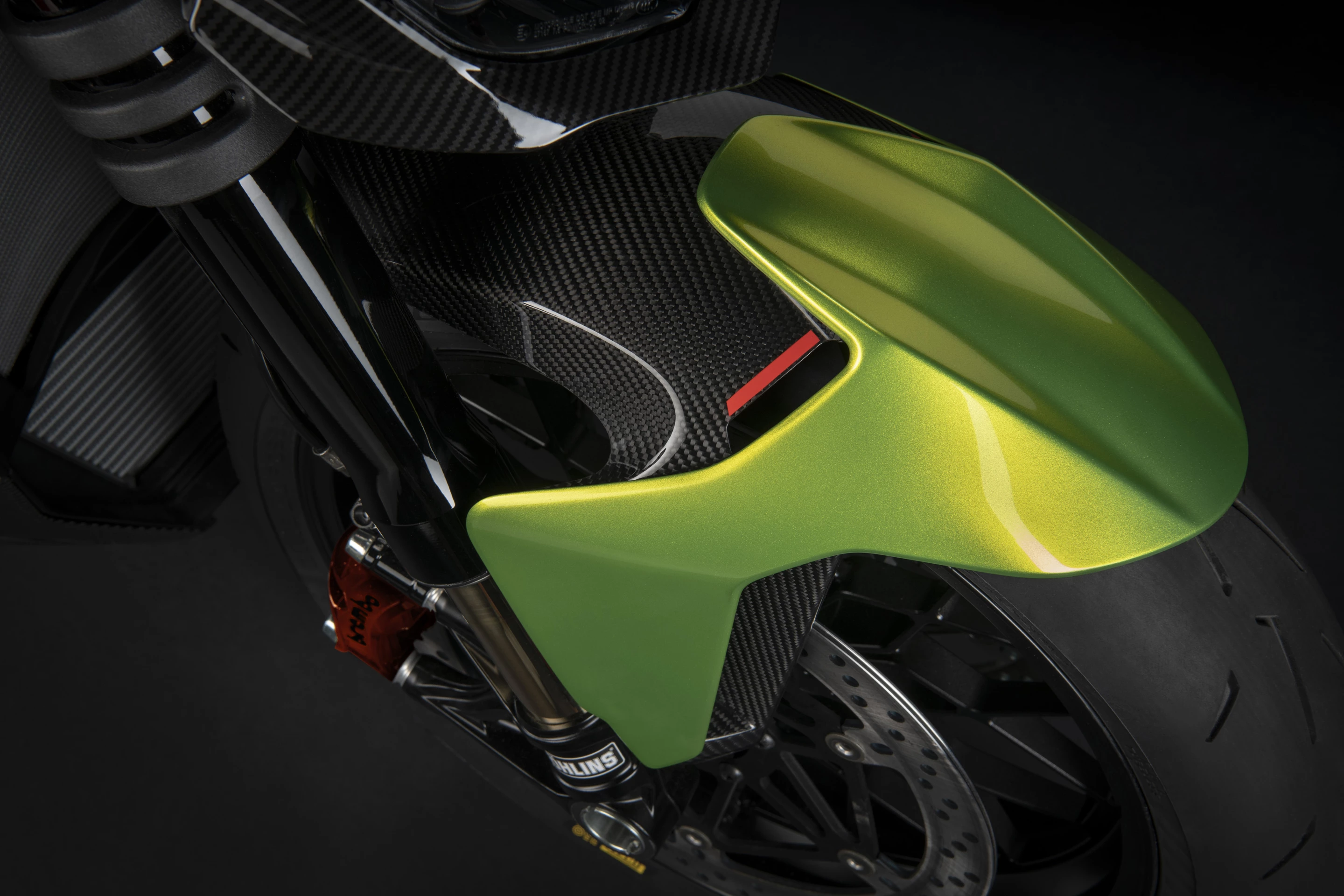 The front mudguard of the 2023 Streetfighter V4 Lamborghini is styled after the hood and fender combo of the Huracan STO