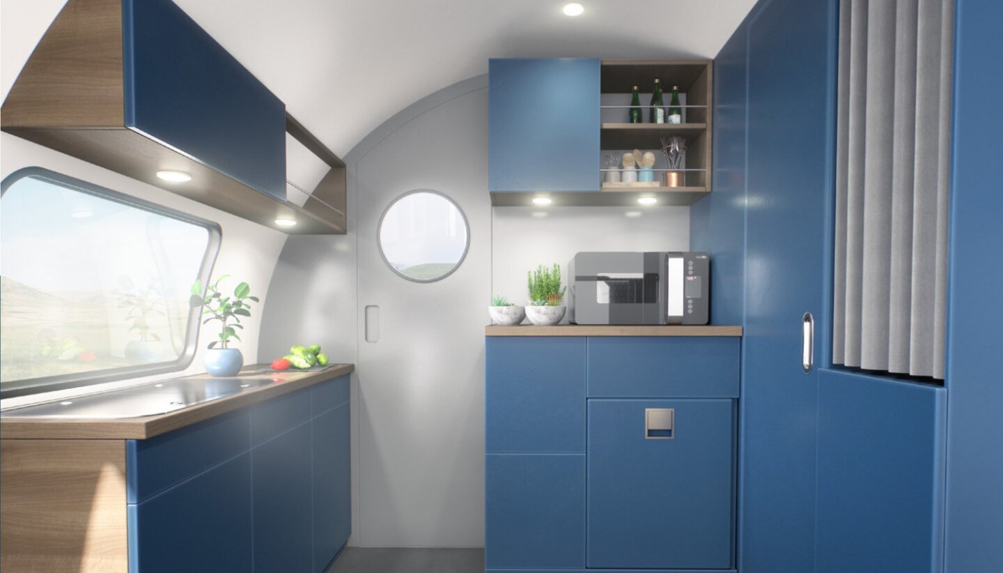 Instead of an outdoor galley, the Beauer 2X expands to offer a roomy indoor kitchen
