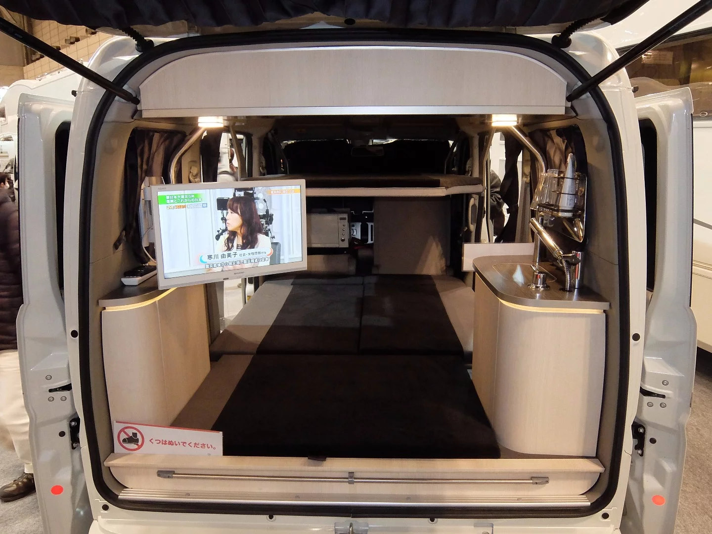 This luxury interior is of a small Kei-Van with everything ... including the kitchen sink