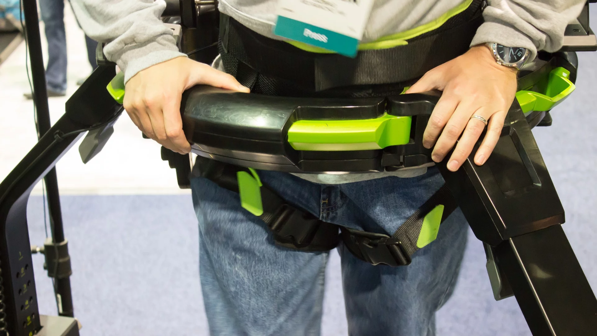 Strapping into the Virtuix Omni, via harness
