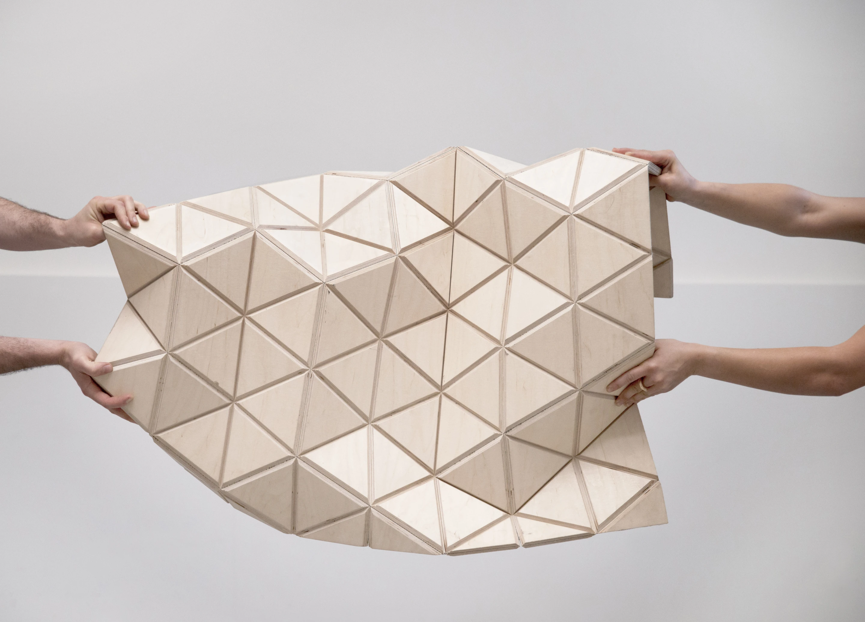 The current WoodSkin product is a sandwich of plywood triangular tiles with a textile mesh in-between (Image: MammaFotogramma)