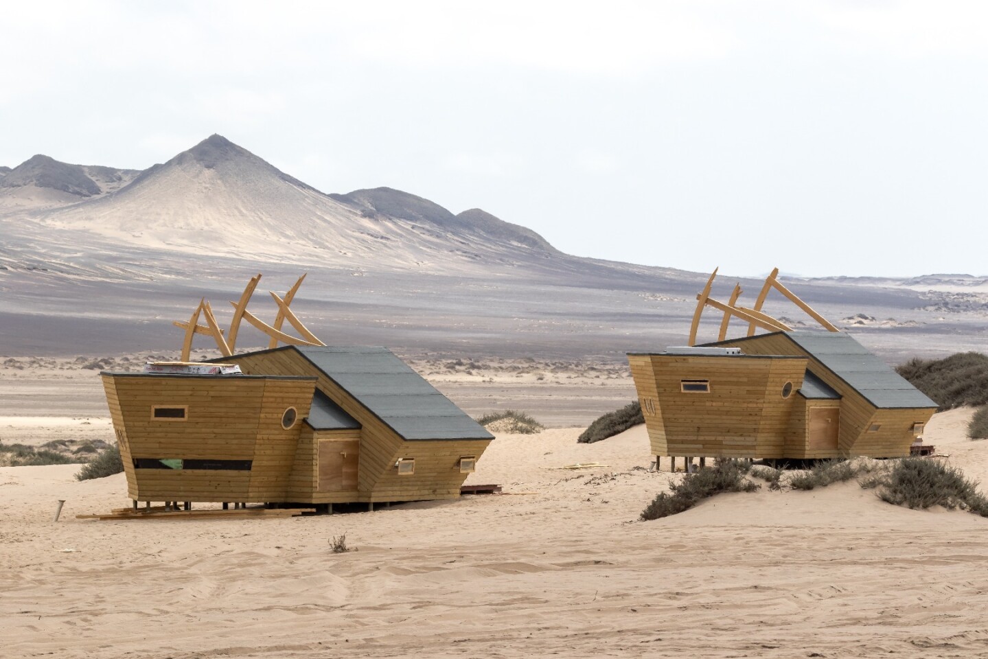 Inside the cabins at Namibia's Shipwreck Lodge, guests find a wood burner stove and an ensuite