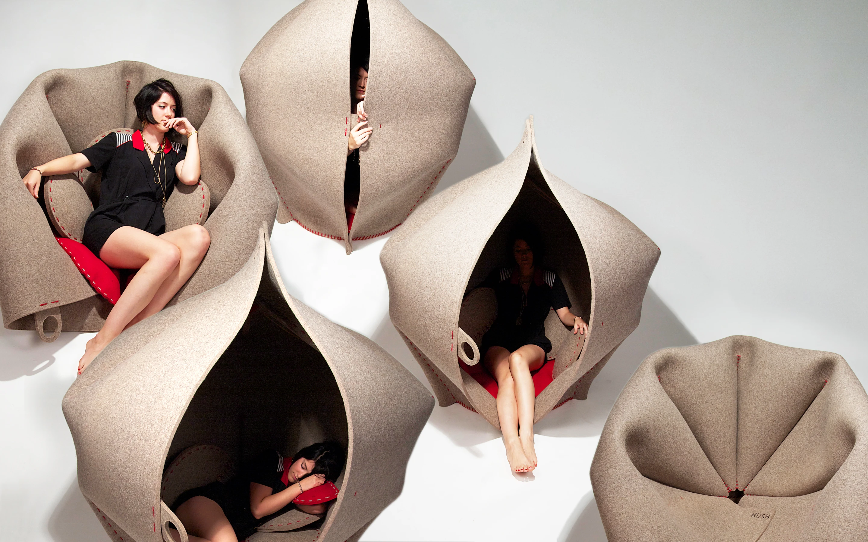 Designed to address our need to sometimes be alone in an increasingly interconnected world, HUSH by UK-based designer Freyja Sewell is a "womb-shaped" pod fashioned from 100-percent woollen felt designed for quiet moments of contemplation or rest