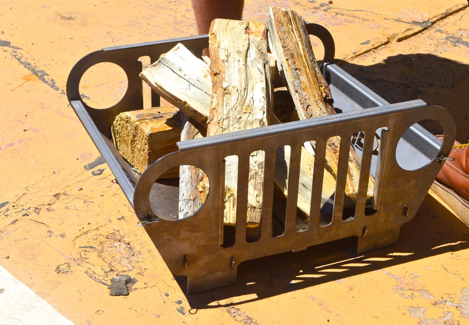 Probably the coolest portable firepit we've seen - a must for Jeep guys and gals. Genright Offroad sells this laser-cut fire pit for $200 for those wondering