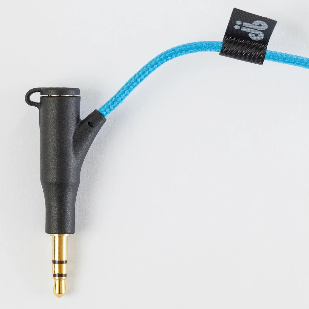 With kids in mind, the cable is wrapped in fabric for better durability and to prevent tangles, and the extra port has an attached cap to keep out dust and pocket lint