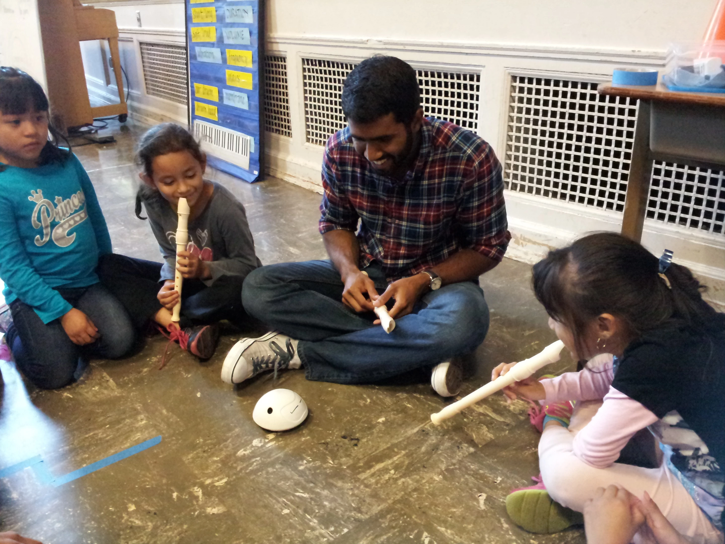 Creator Vivek Mano demonstrates the Wigl bot to future engineers