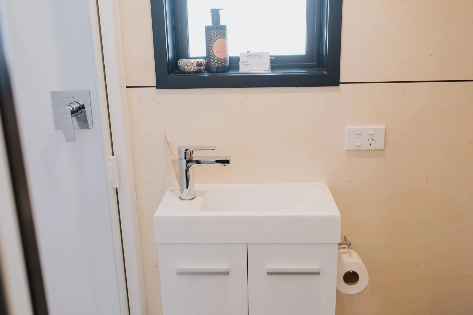 Shot of La Sombra Tiny House's small bathroom sink