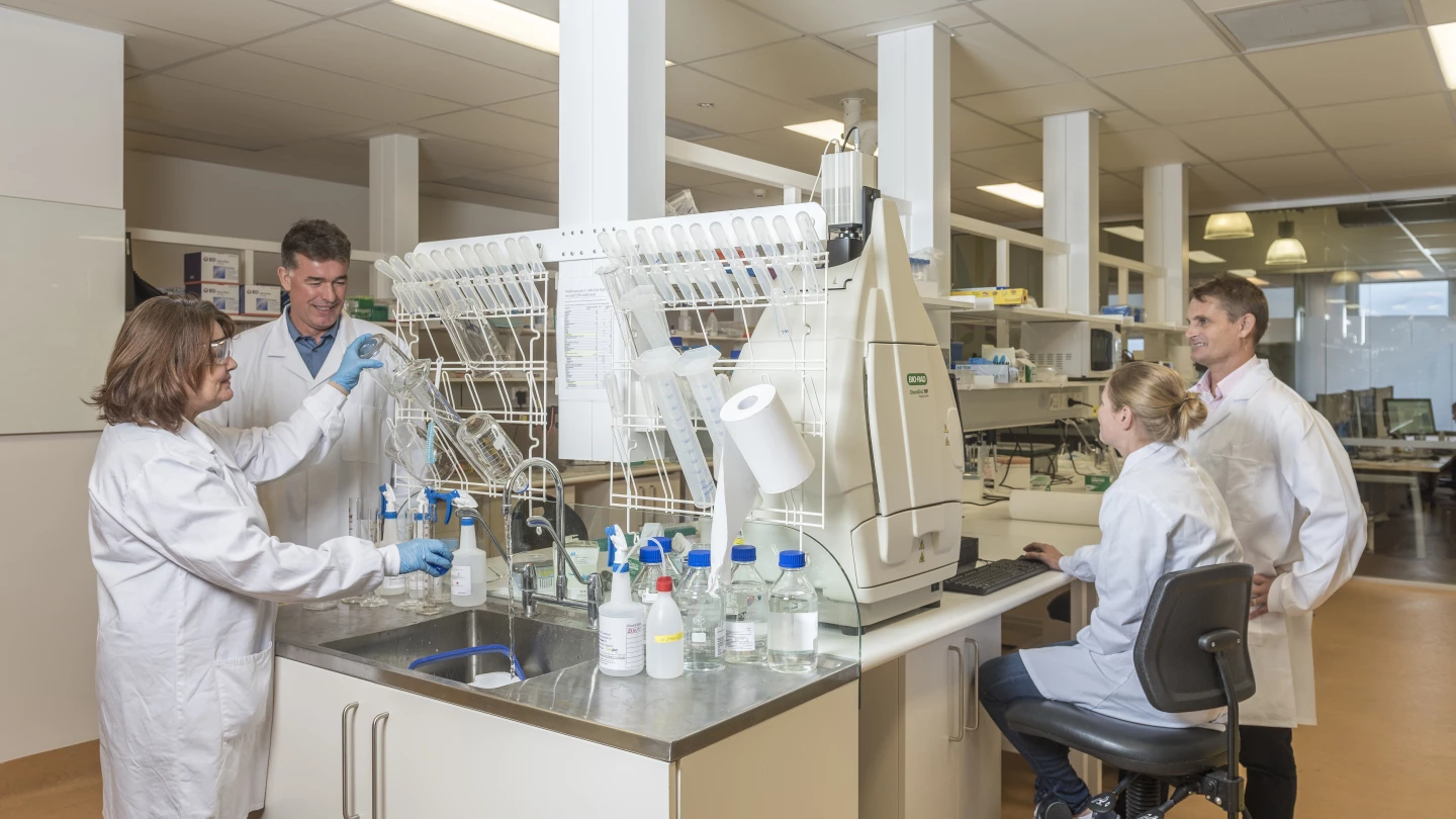 Professor Iain McGregor (second left) and Professor Jonothan Arnold (right) in the Sydney lab