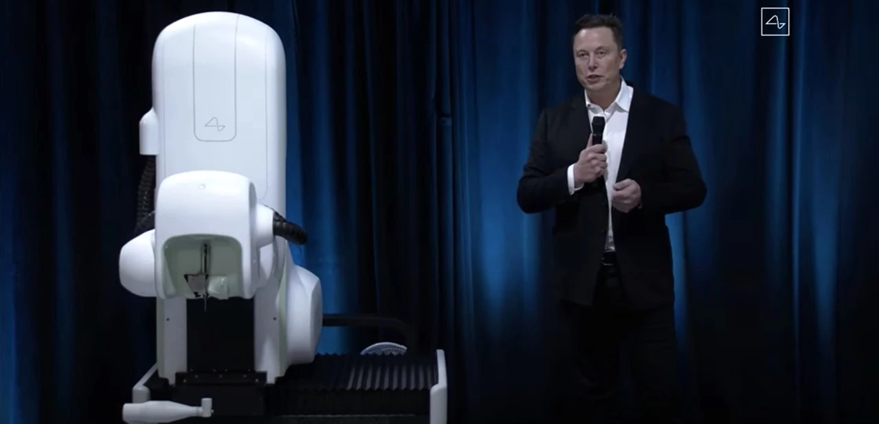 Elon Musk on stage at the Neuralink presentation