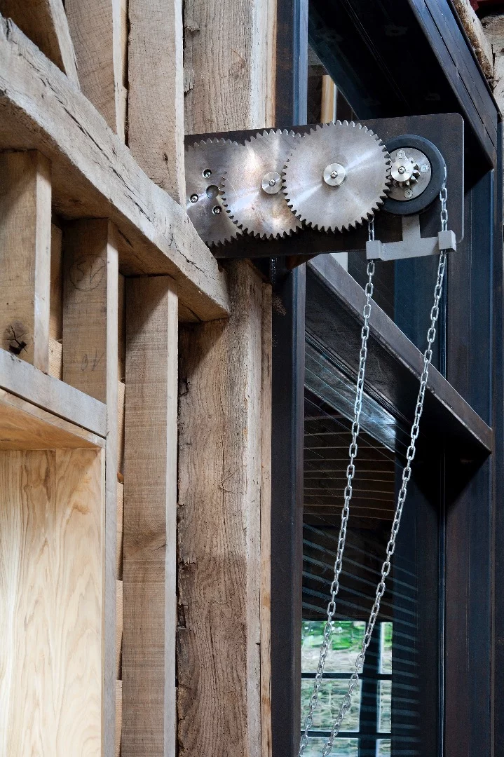 The industrial mechanism used to open the home to the outside
