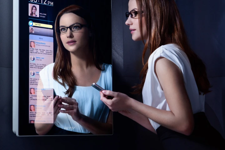 The Cybertecture Mirror presents users with a wealth of information while looking at their reflection - including weather and news, social network feeds, streamed internet TV, personal health information and can even act as a personal exercise coach