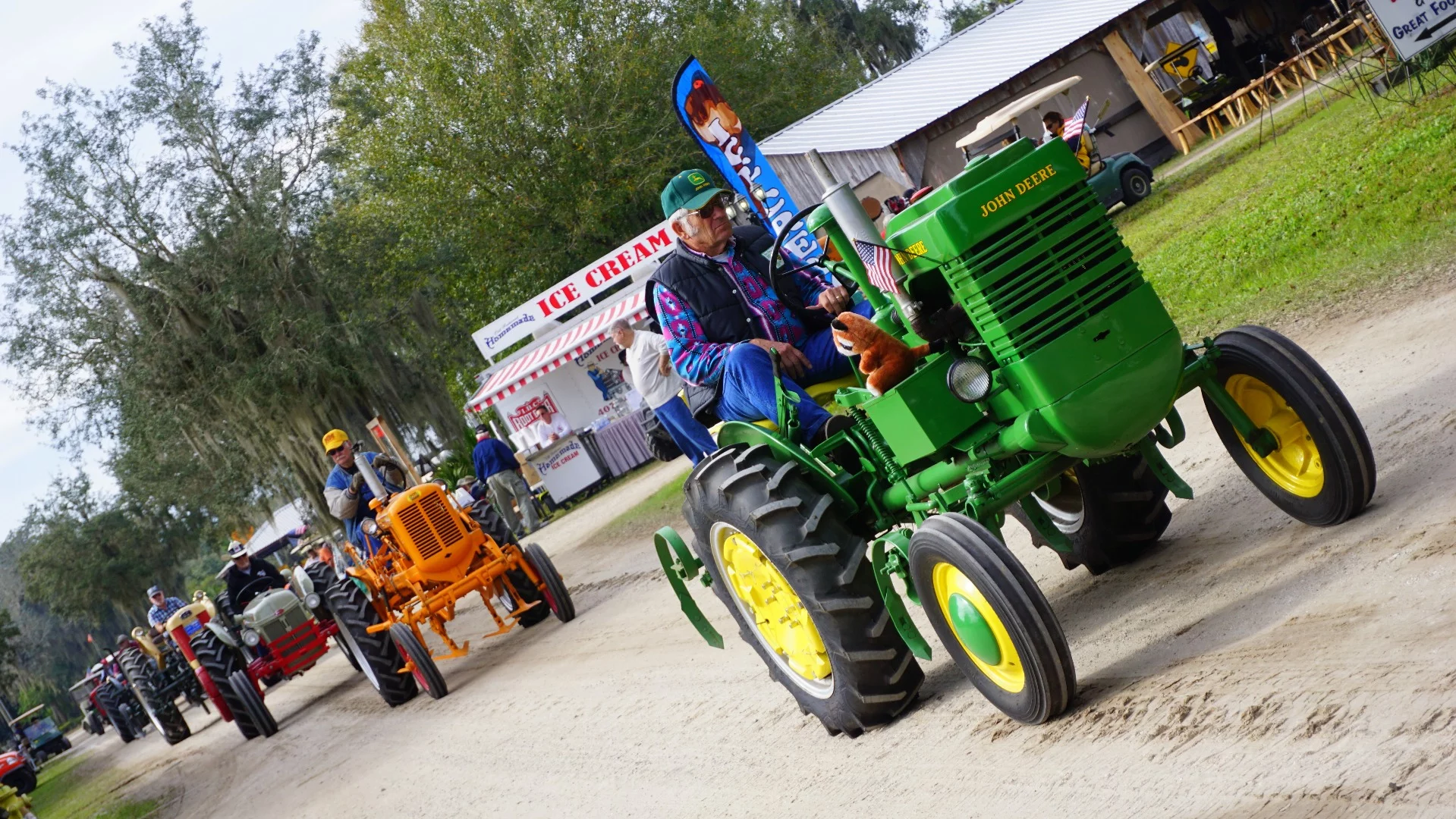 One of the many John Deere's on display and driving around the property all day