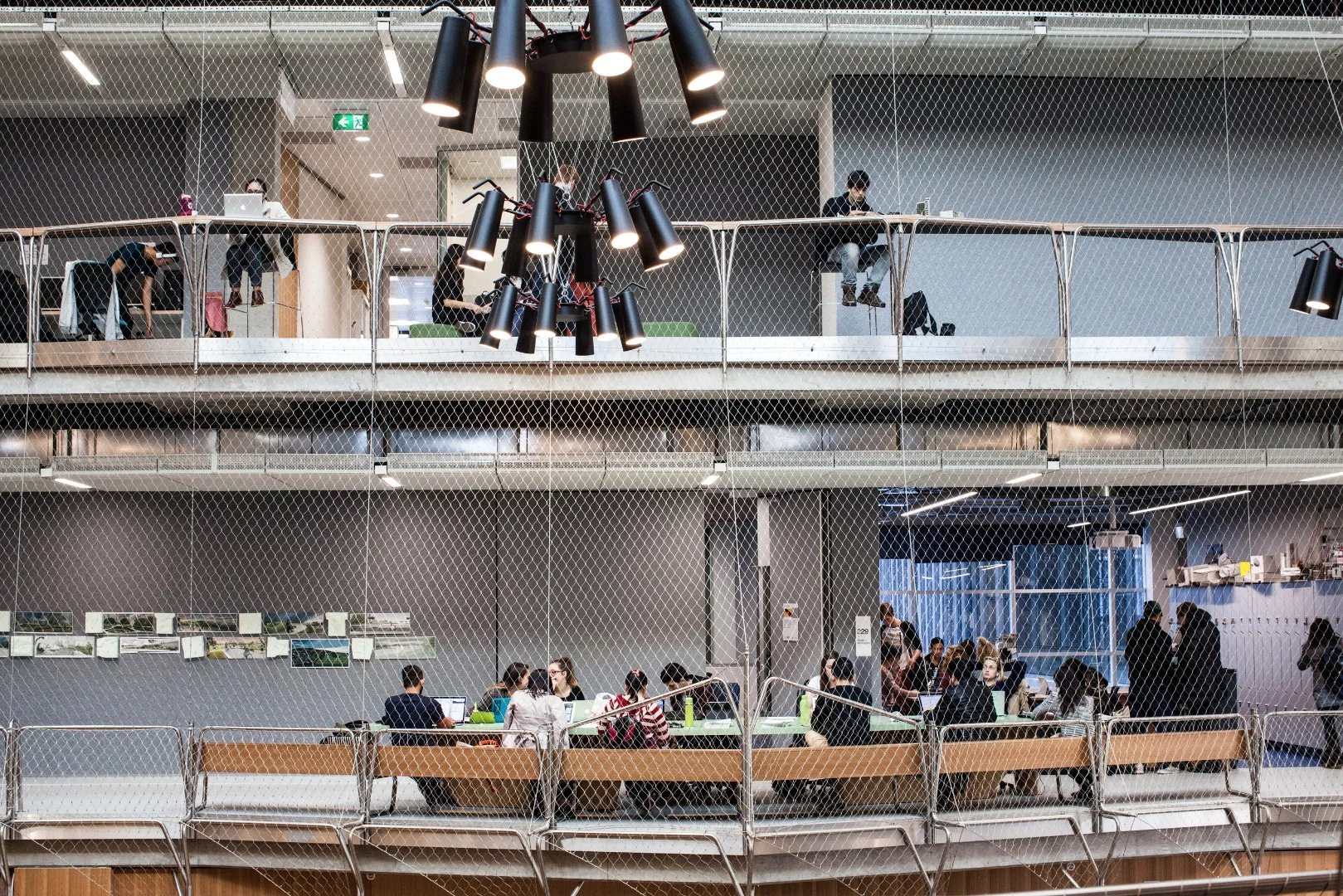 Many aspects of the building are left uncovered such as the mesh balustrades, bare concrete surfaces and exposed stairways
