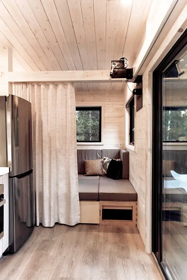 The Draper's living room can be partitioned with a curtain