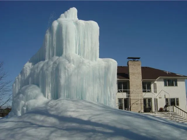Roger Hanson uses water from his home's geothermal heating system to create elaborate ice sculptures in his backyard