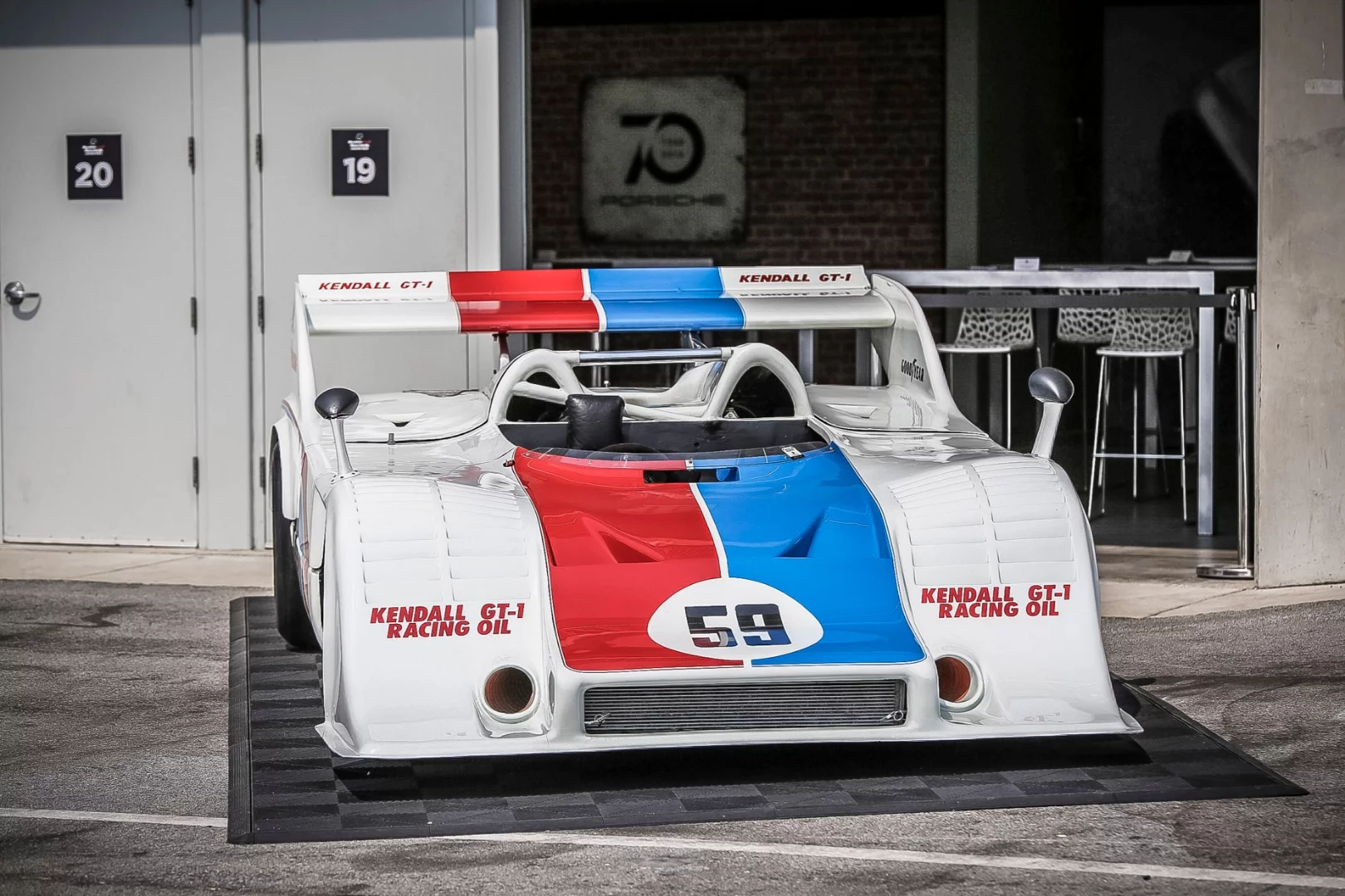 Kendall GT-1 racing oil sponsored car on display behind the pits