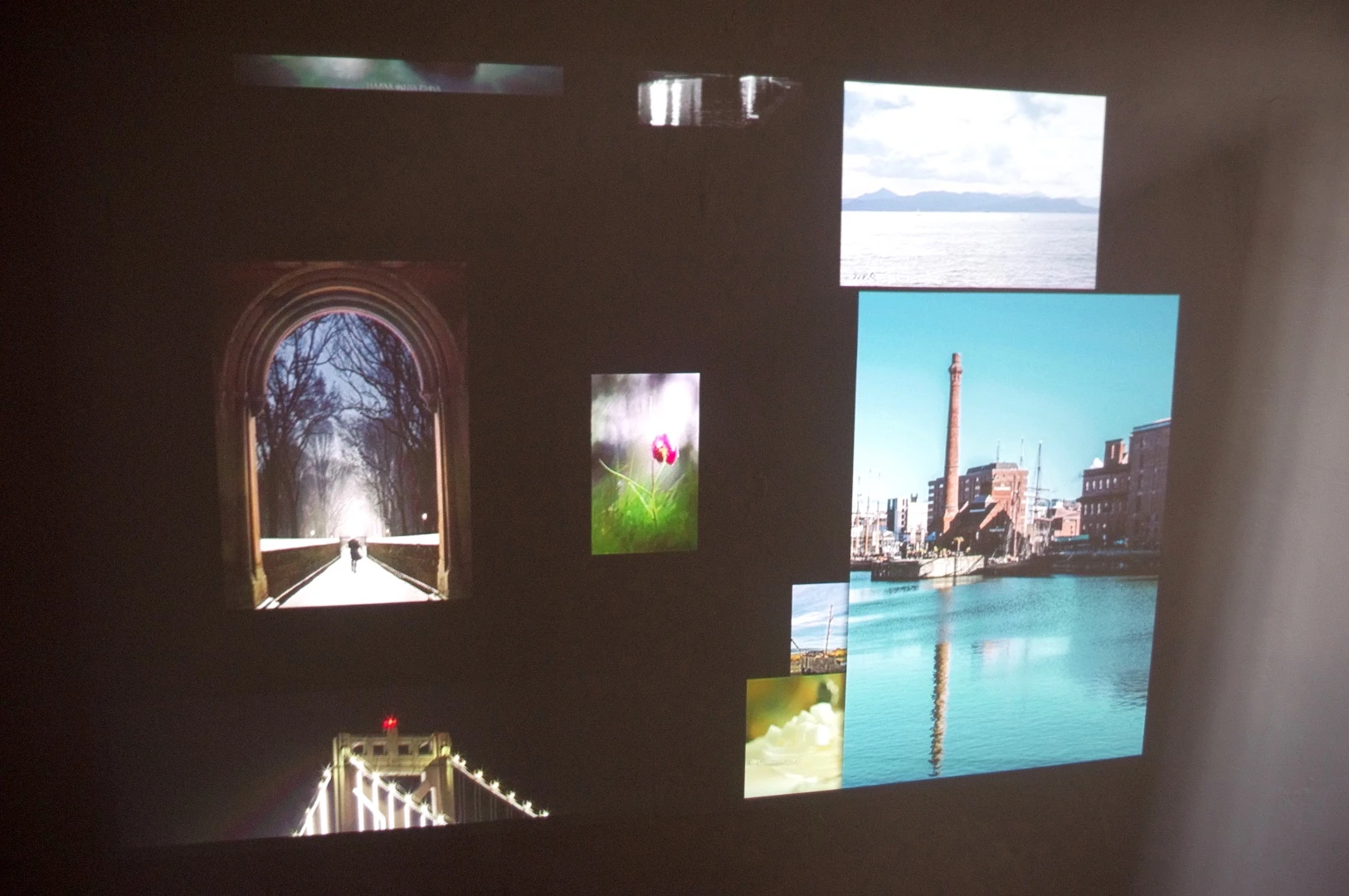 The projector works great at displaying videos and photos, like these from the Apple TV screensaver