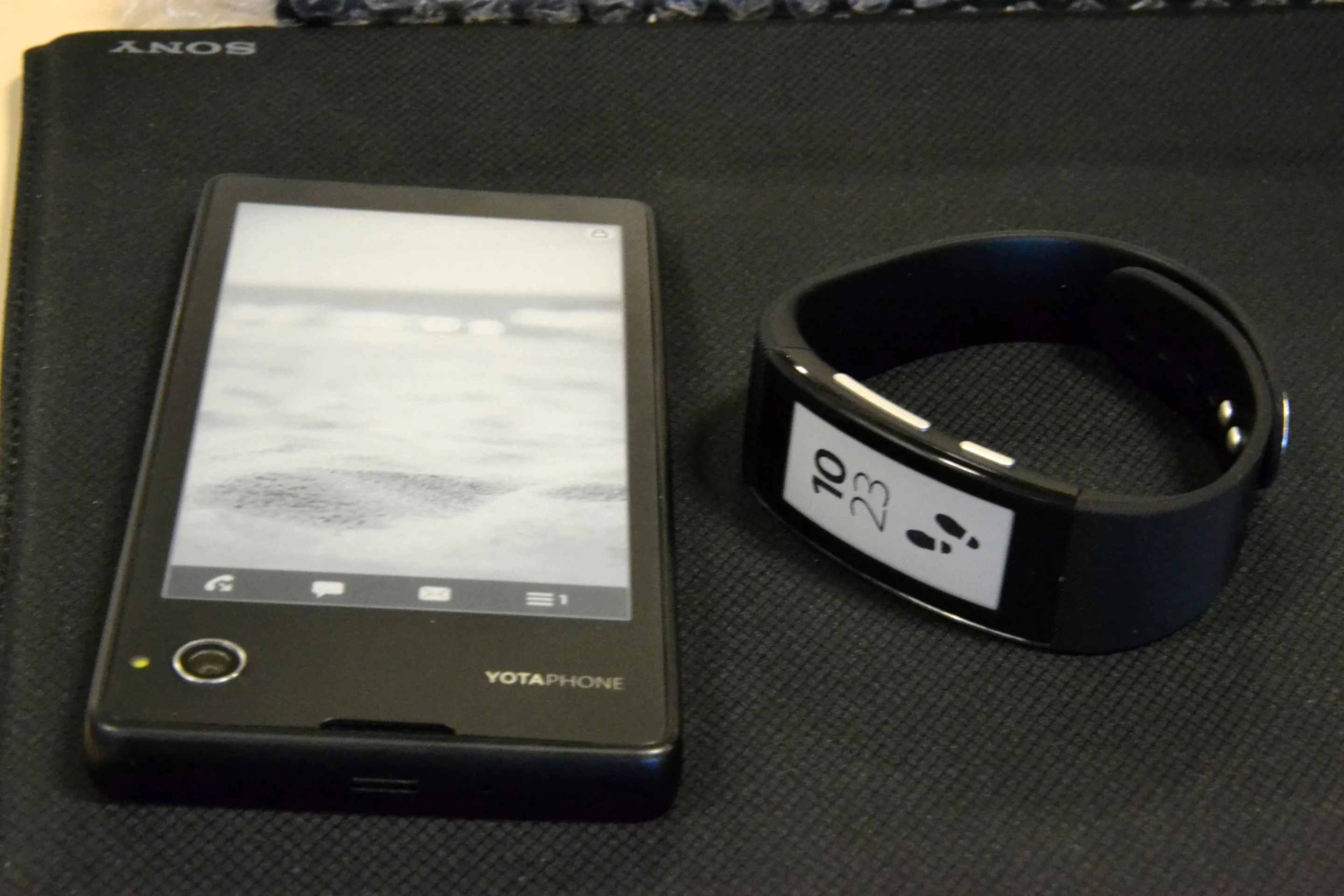 The YotaPhone (left) and Sony's new SmartBand Talk (right) (Photo: Paul Ridden/Gizmag)