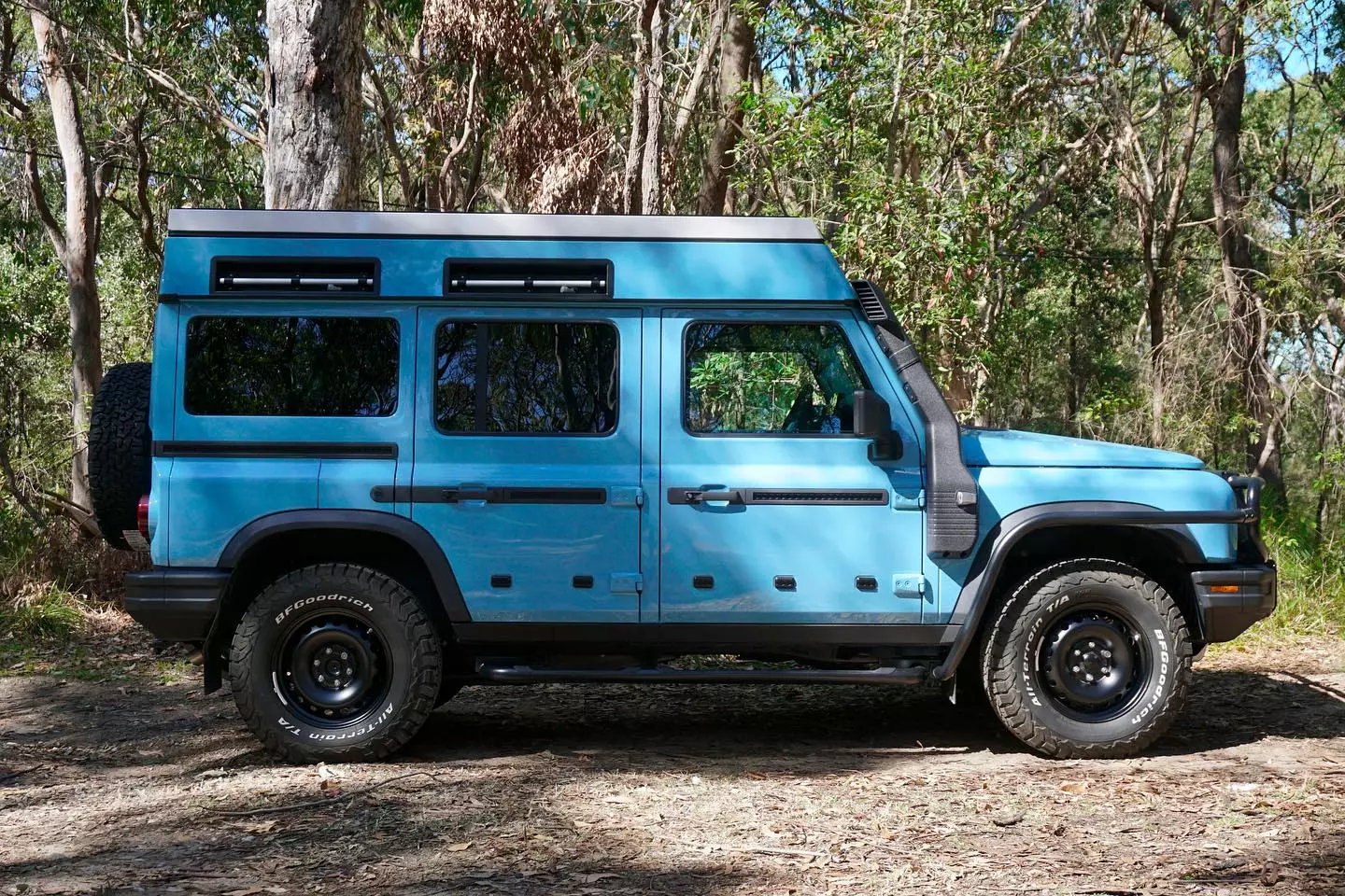 Expedition Centre includes the same style of long side cavities with integrated handles and power points as the stock Ineos roof