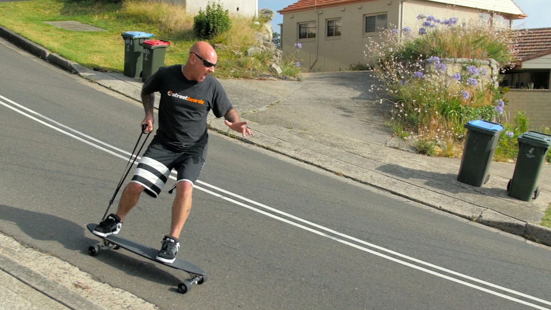 The Boarder Control Skateboard has a rear leash, which activates a set of brakes when pulled