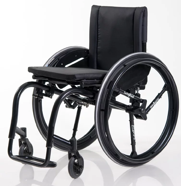 A wheelchair equipped with SoftWheel's Acrobat wheels