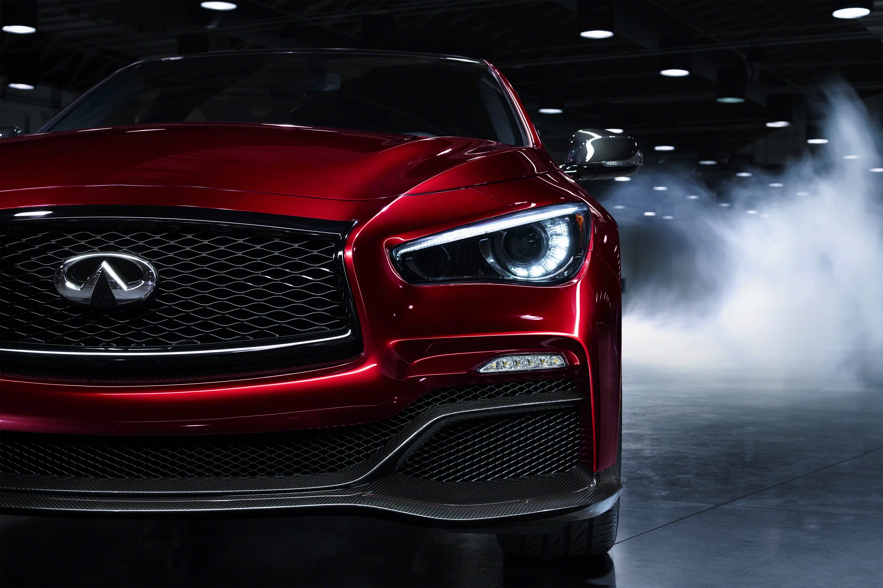 Lower and wider, with a more muscular, sculpted demeanor, the Eau Rouge receives a significant carbon fiber body makeover. Wider translates into front and rear fenders flared out another 20 mm horizontally