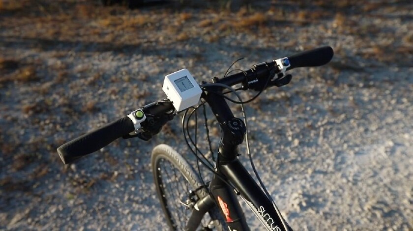 Two handlebar-mounted buttons are used to rotate the CycleWing to either side, in order to better catch the wind