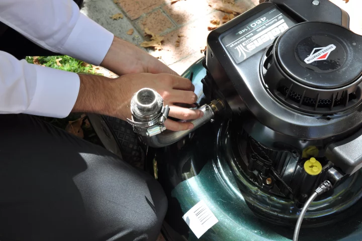 The UCR NOx-Out device replaces the muffler on an existing gas mower