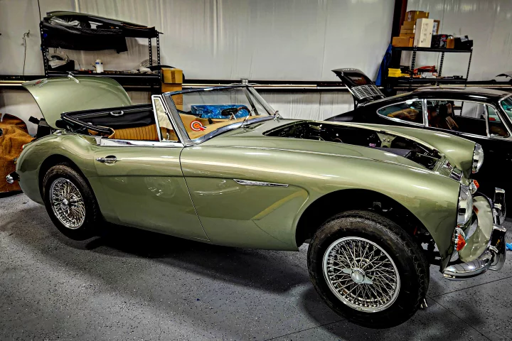 One of two beautiful, tiny Healy 3000 convertibles in the Moment Motors shop