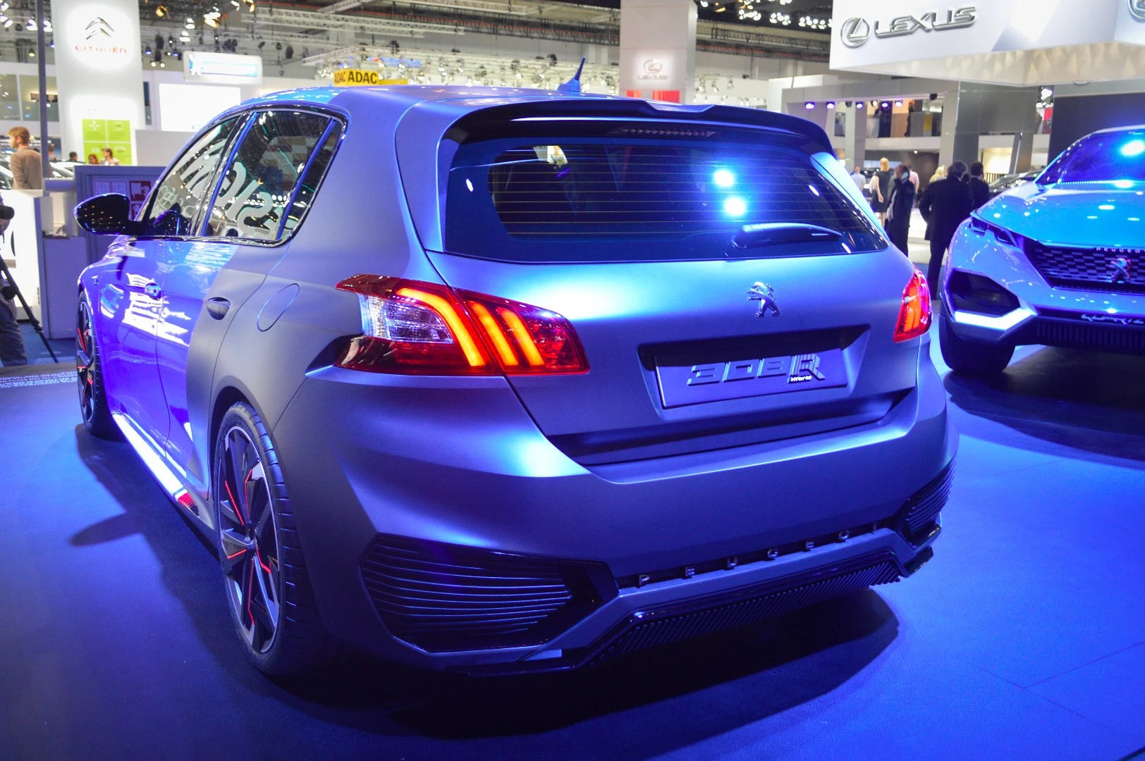 A "compact hatchback that drives like a supercar," the Peugeot 308 R Hybrid concept has a 500-hp petrol-electric hybrid powertrain