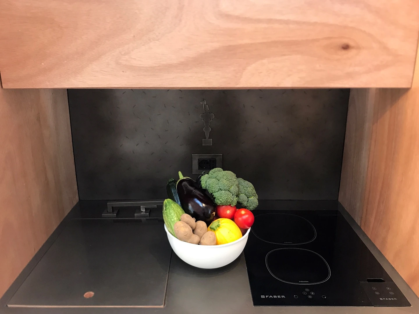 aVOID's kitchenette includes an induction stove