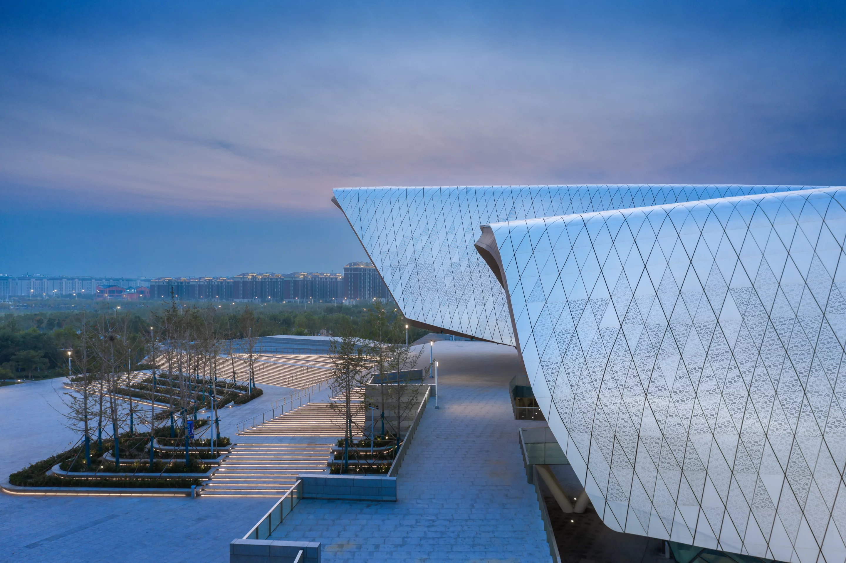 The National Maritime Museum of China's patterned exterior is designed to shed heavy snow loads