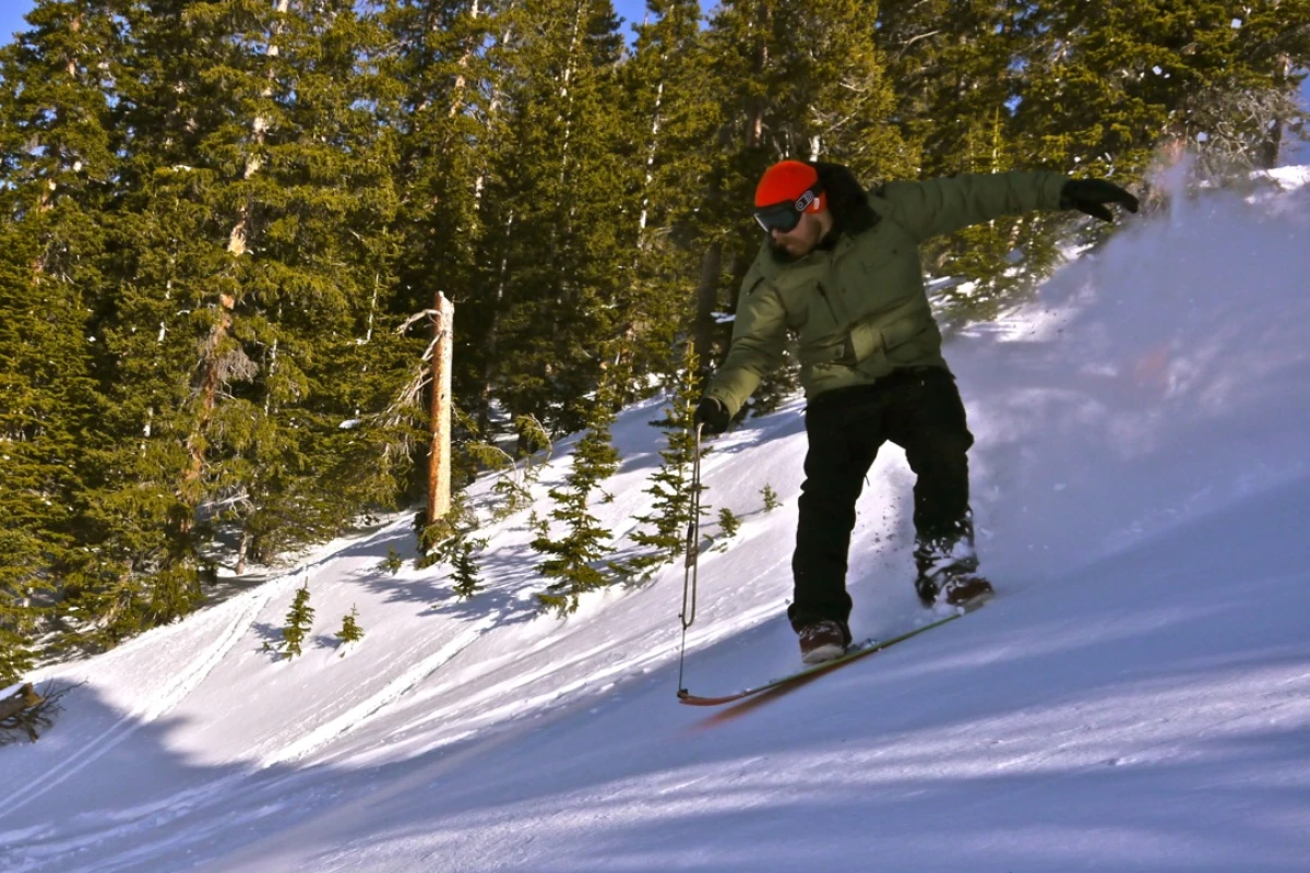 The Signal crew surfs powder in roped "Snurfer" fashion Photo: Erin Paul Hines