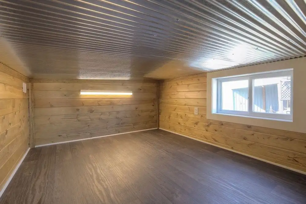 For the money, you get 312 sq ft (28 sq m) of floorspace constructed from a single 40 ft (12 m) shipping container that has been cut and extended in height