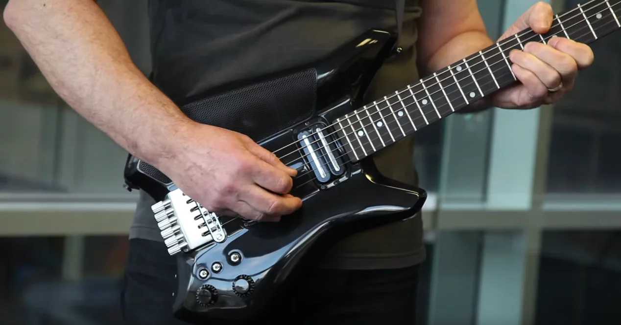 The guitar has two 30 W Tymphany Pearless full range speakers and an upfiring high/midrange driver that acts kind of like a stage monitor