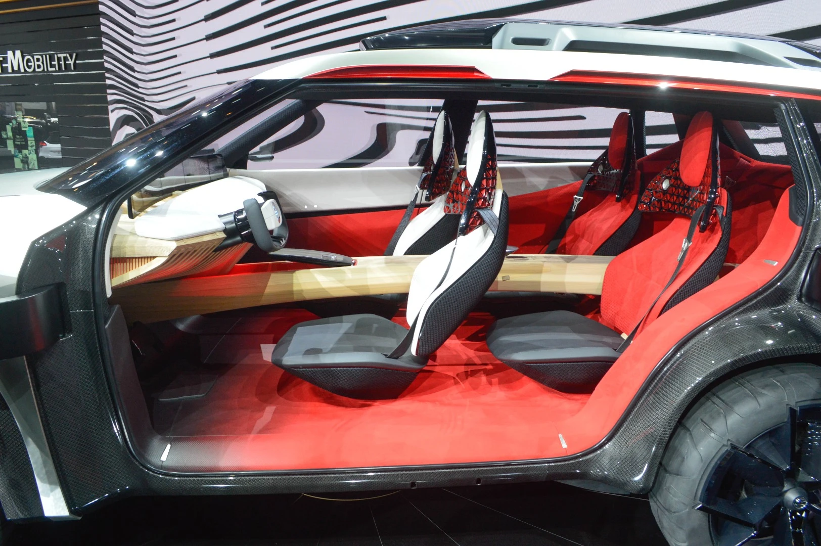 The Xmotion features a wood center console made with Japanese woodcrafting techniques